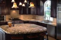 Right at the start, we decided that the focal point of the kitchen would be the island. At that time we were unsure about what material we would use for the island top, so we went on a quest. We spent several days visiting virtually all of the natural stone distributors in the Dallas/Ft. Worth area